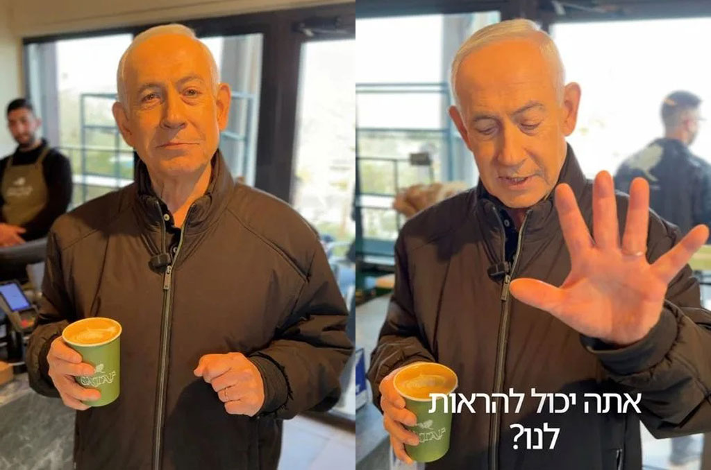 内塔尼亚胡在耶路撒冷郊区一家咖啡馆喝咖啡并与助手交谈