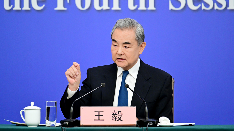 中国外交部长王毅出席十四届全国人大四次会议外交主题记者会