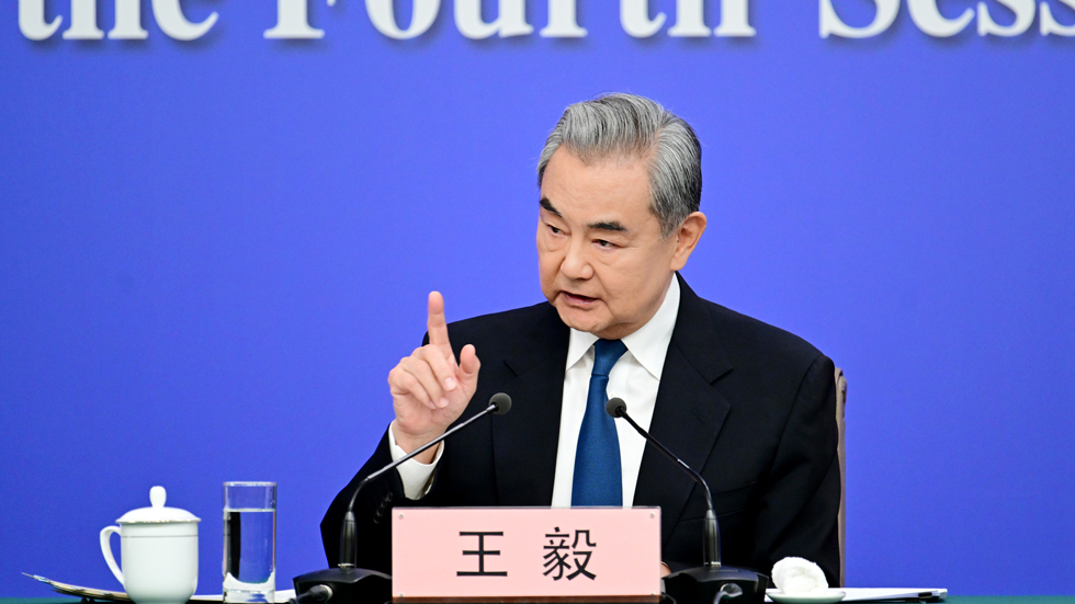 中国外交部长王毅出席十四届全国人大四次会议外交主题记者会